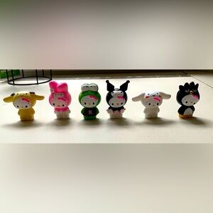 *** New***Hello Kitty mini figurines , dressed as her friends ❤️